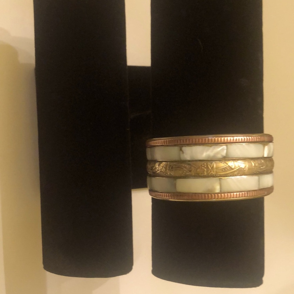 Unique vintage brass bracelet with copper border and mother of pearl inlay.